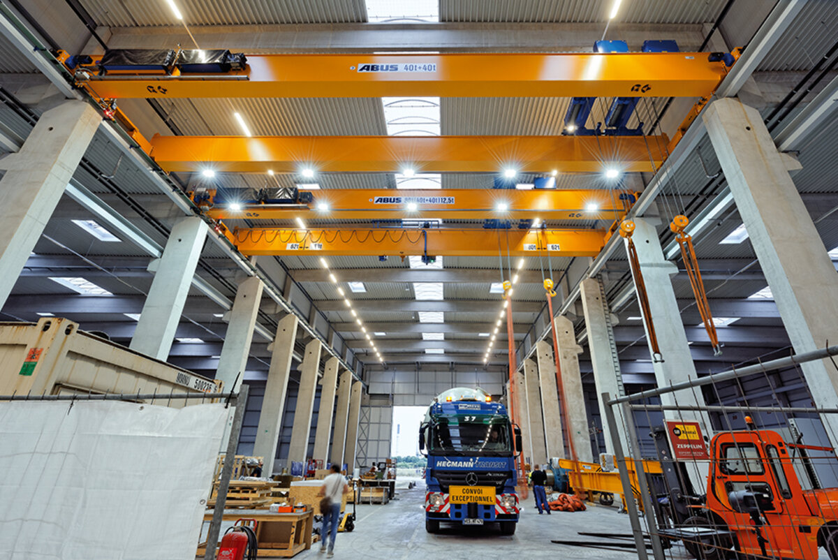 ABUS EOT cranes for multipurpose logistics building handling heavy goods
